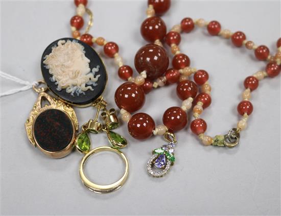 A yellow metal hardstone cameo brooch, a 10ct spinning fob, an 18ct gold and diamond ring and other items.